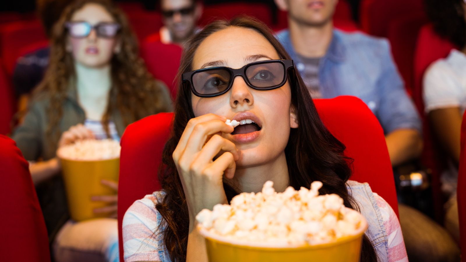 Why Do We Eat Popcorn at the Movies? The Crunchy History of Cinema's ...